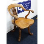 Late 19th/early 20th century oak swivel 'Captains' office chair.