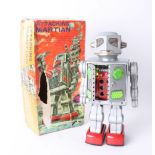 Attacking Martian battery operated tinplate toy, boxed.