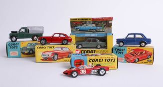 Collection of four models including Corgi 438 Land Rover, 327 MG B GT, 154 Ferrari, 251 Hillman