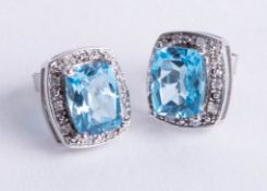 A pair 9ct diamond and topaz rectangular earrings.