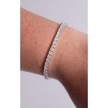 A fine 18ct white gold and diamond set bracelet, set with approx 8.60 carats of diamonds, length