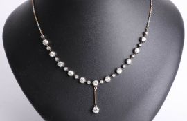 An antique diamond set necklace, with a centre bar drop, multi gold twisted rope chain link fitting,