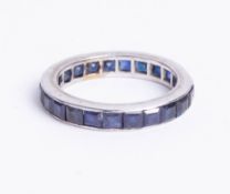 A white gold sapphire full eternity ring, size N.