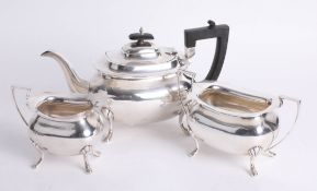 A Geo V silver three piece tea service, Walker & Hall, approx 42.60 oz.