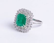 An emerald and diamond cushion shape