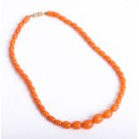 An amber bead necklace, graduated, approx 12.40g, length 32cm.