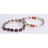 A modern Mexican bracelet, set with 17 stones, marked 10k, also a 9k multi coloured stone