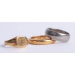 A 22ct wedding band approx 5.90g, 18ct white gold band, approx 6.20g and a signet ring, approx 2.50g