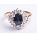 An 18ct gold sapphire and diamond cluster ring, mixed cut diamonds, size N.
