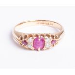 An antique 18ct ruby and diamond ring, size N.