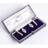 A pair 9ct gold and enamelled gents cufflinks, boxed.