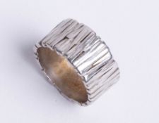 A platinum bark finished band ring, approx 13.30g, size L.