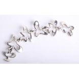 Georg Jensen, 'Splash', a Danish Sterling silver bracelet designed by Henning Koppel, numbered