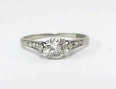 A platinum and diamond solitaire ring, size L.