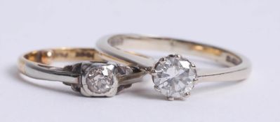 An 18ct white gold and diamond set solitaire ring and another (2).