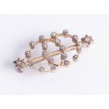 A pretty Edwardian diamond set brooch, 35mm x 20mm.