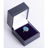 An opal set ring, size 13mm x 11mm, size L.