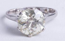 A large diamond solitaire ring, approx 3.56 carats, cushion shaped and old brilliant cut diamond,