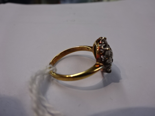 An 18ct nine stone diamond cluster ring, size K. - Image 2 of 6