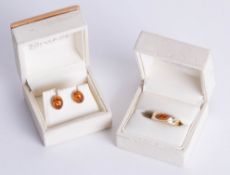 A pair of amber earrings and similar ring, size P.