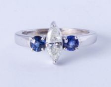 A pretty 18ct sapphire and diamond set ring, size J.