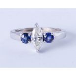 A pretty 18ct sapphire and diamond set ring, size J.