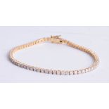 An 18ct diamond bracelet set in yellow gold with approx 3 carats of diamonds, length 18cm.