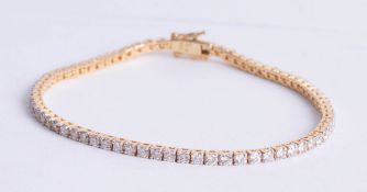 An 18ct diamond bracelet set in yellow gold with approx 3 carats of diamonds, length 18cm.
