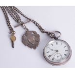 A silver pocket watch, sub seconds, key wind and albert.