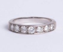 A platinum and diamond set eternity ring, approx one carat, size T.