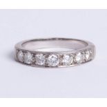 A platinum and diamond set eternity ring, approx one carat, size T.