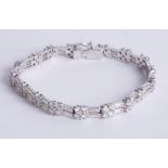 A fine 18ct white gold diamond bracelet, set with 102 diamonds, total weight approx 8.84 carats,