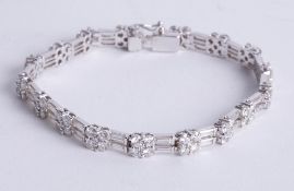 A fine 18ct white gold diamond bracelet, set with 102 diamonds, total weight approx 8.84 carats,