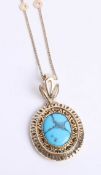 A 14k turquoise set pendant on an 18ct chain pendant, size 35mm x 29mm.