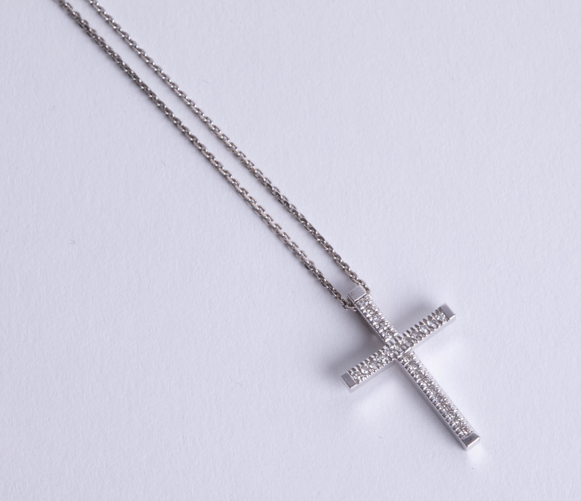 A 9ct white gold and diamond set cross, 3g, boxed. - Image 2 of 2