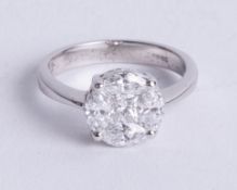 An 18ct diamond cluster ring, set with marquise and princess cut diamonds, diameter 9mm, approx 1.25