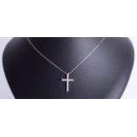 A 9ct white gold and diamond set cross, 3g, boxed.