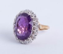 A large amethyst and diamond cluster ring, size R.