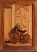 A wood cut panel with portrait of middle eastern man, 31cm x 22cm.