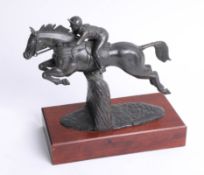 Timothy Simmons 1993 bronze effect sculpture of jockey on wood plinth total height 28cm.