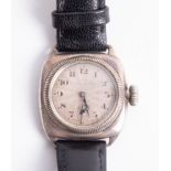 A vintage cushion cased silver wristwatch with manual movement and sub seconds, probably Rolex,