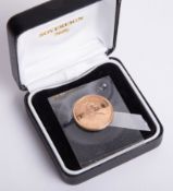 A 2000 QEII full gold sovereign, boxed.