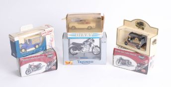 A collection of model vehicles including three motorbikes and four cars (7).