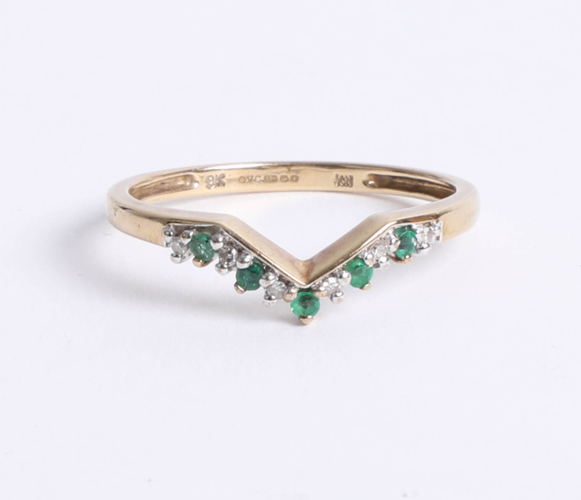 A 9ct emerald and diamond qvc wishbone ring.