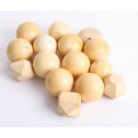 Fifteen ivory billiard balls.