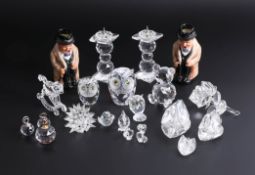 A collection of small Swarovski figures and two small Royal Doulton 'Winston Churchill' jugs.