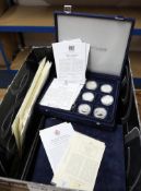 A large collection of silver proof coins and commemorative first day covers including 'Great