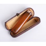 Victorian amber and gold mounted cig holder, cased.