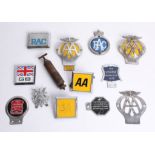 Twenty car badges including AA badges, RAC badges etc.