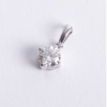 An 18ct white gold and diamond set pendant, approx 0.60ct.